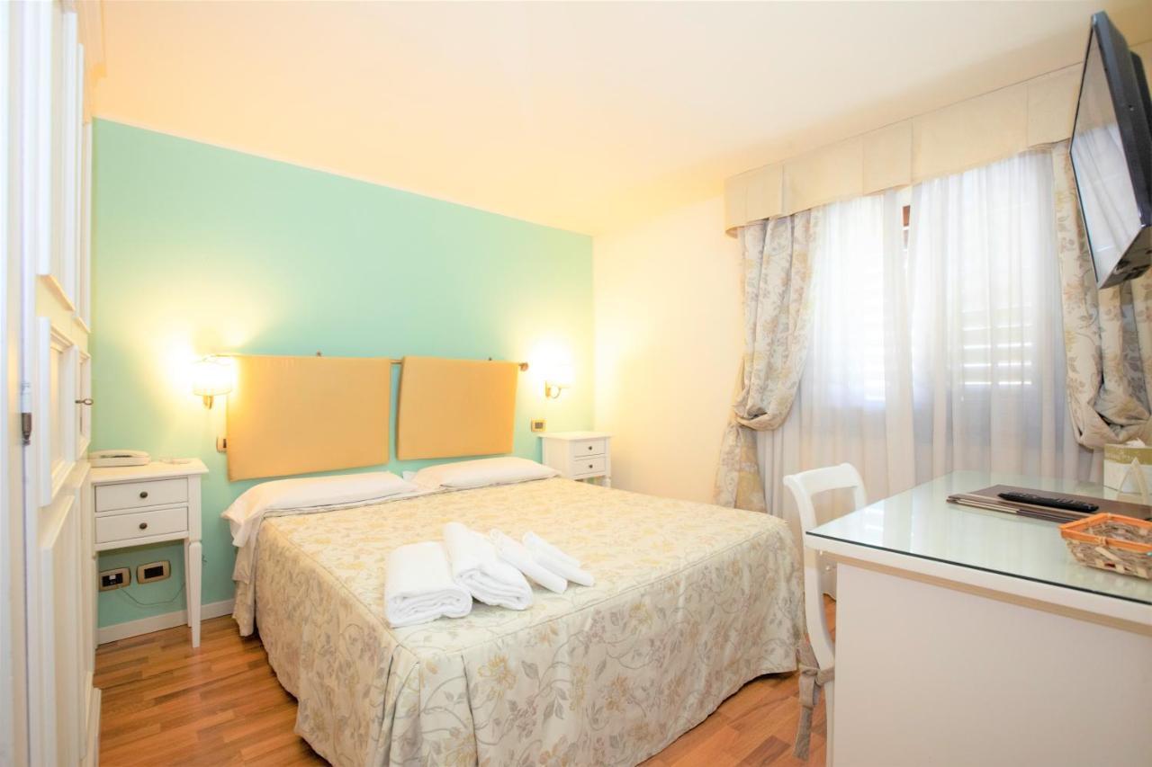 Hotel Arcobaleno Siena Bagian luar foto